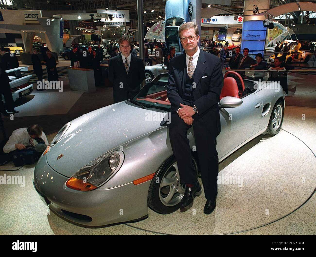 Dr. Wedelin Wiedeking, President of Porche AG with his company's new Boxter sports car  at Birmingham's NEC today (Tuesday). Picture DAVID JONES/PA Stock Photo