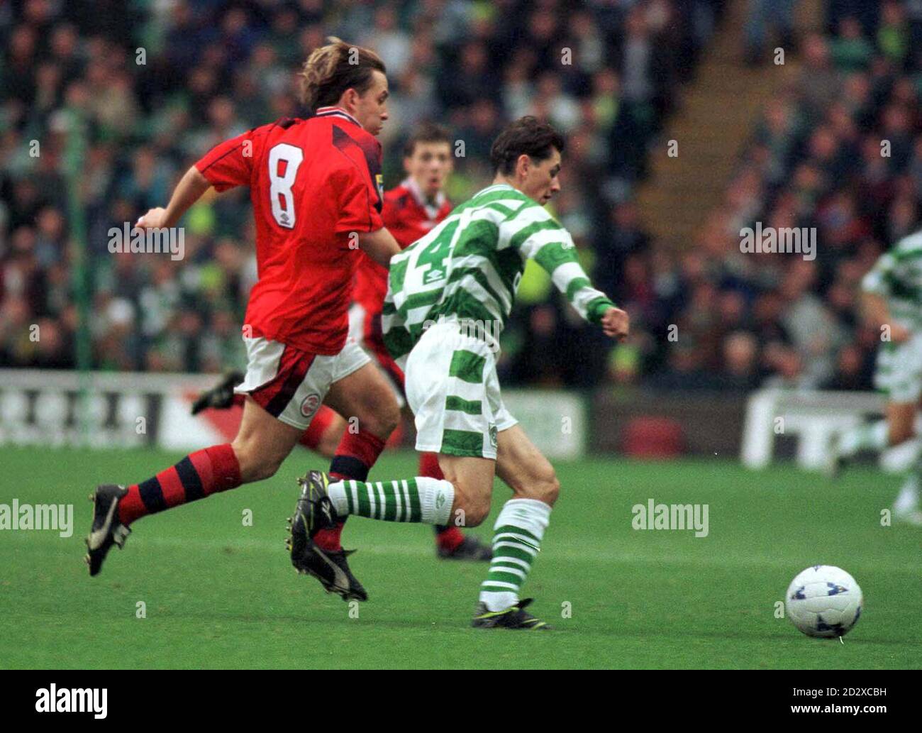 Celtic's Jackie McNamara (right) and Billy Dodds of Aberdeen chase