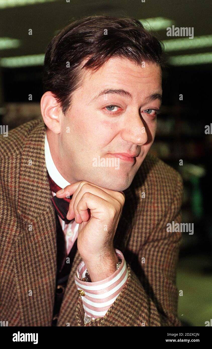Comic actor Stephen Fry at the launch of his book in London. 10/9/98: Has been appointed the founding director of a new association of ex-offenders, following his own youthful brush with crime. 11/10/98: 'Don't be cool. It's very boring' - His advice to pupils.  * at his old school in Uppingham.  R/I: 8/3/99. R/I: 1/6/99. Stock Photo