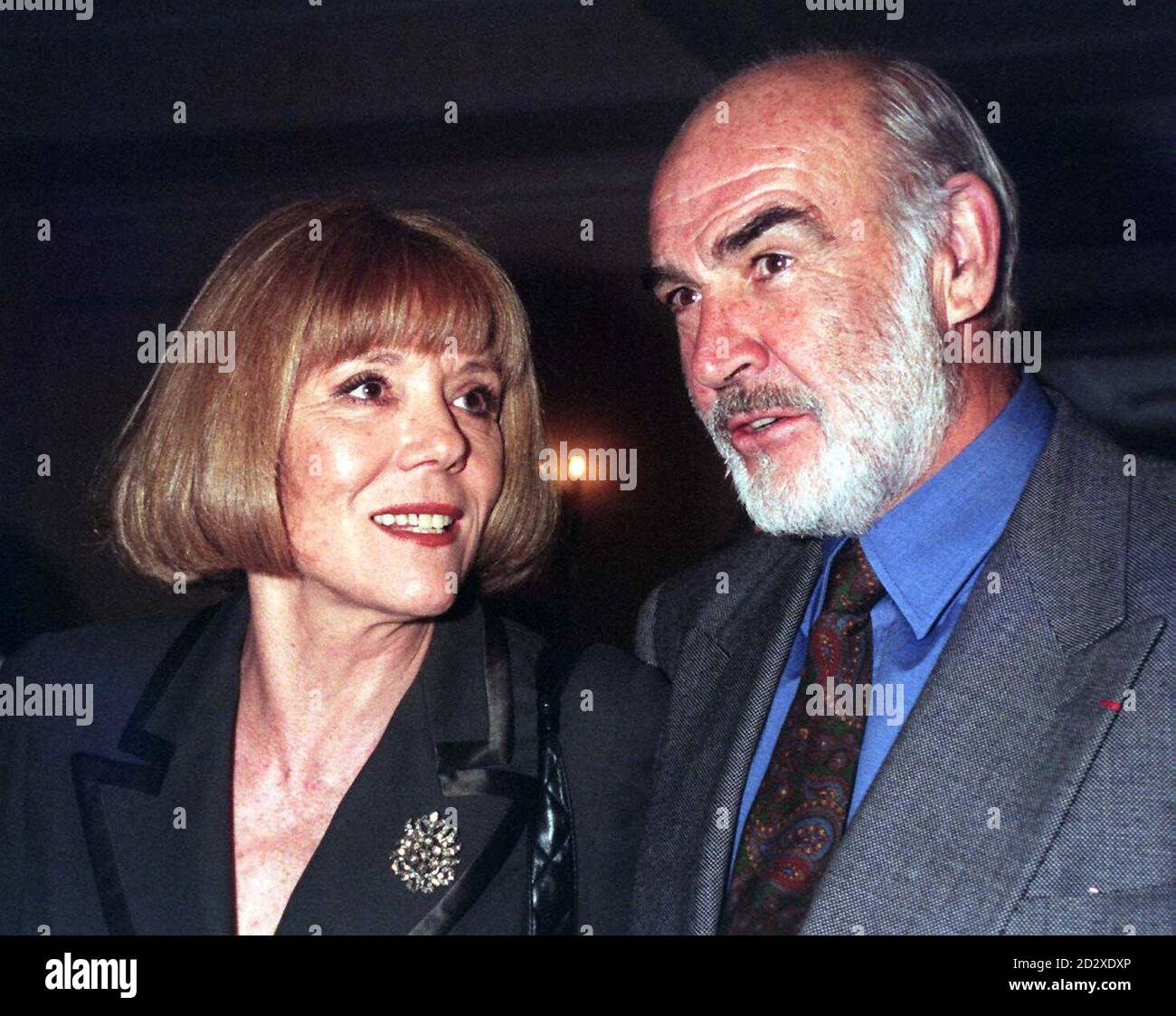 Dame Diana Rigg and Sean Connery attend the 1996 Evening Standard Drama Awards at a ceremony held this afternoon (Friday) at the Savoy Hotel in London and due to be televised tonight by LWT. Ms Rigg is tipped to take the top actress award following her roles in Brecht's 'Mother Courage and Her Children' and as Martha in Albee's 'Who's Afraid of Virginia Woolf'. Mr Connery is to make a rare appearance to present her with her award. See PA Story SHOWBIZ Award/By Tony Harris/PA. Stock Photo