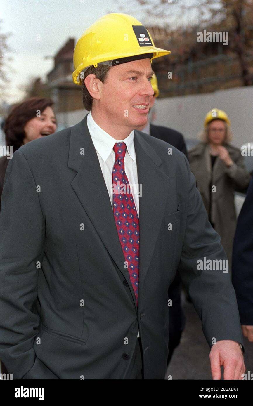 Labour leader Tony Blair visits an energy conservation project in