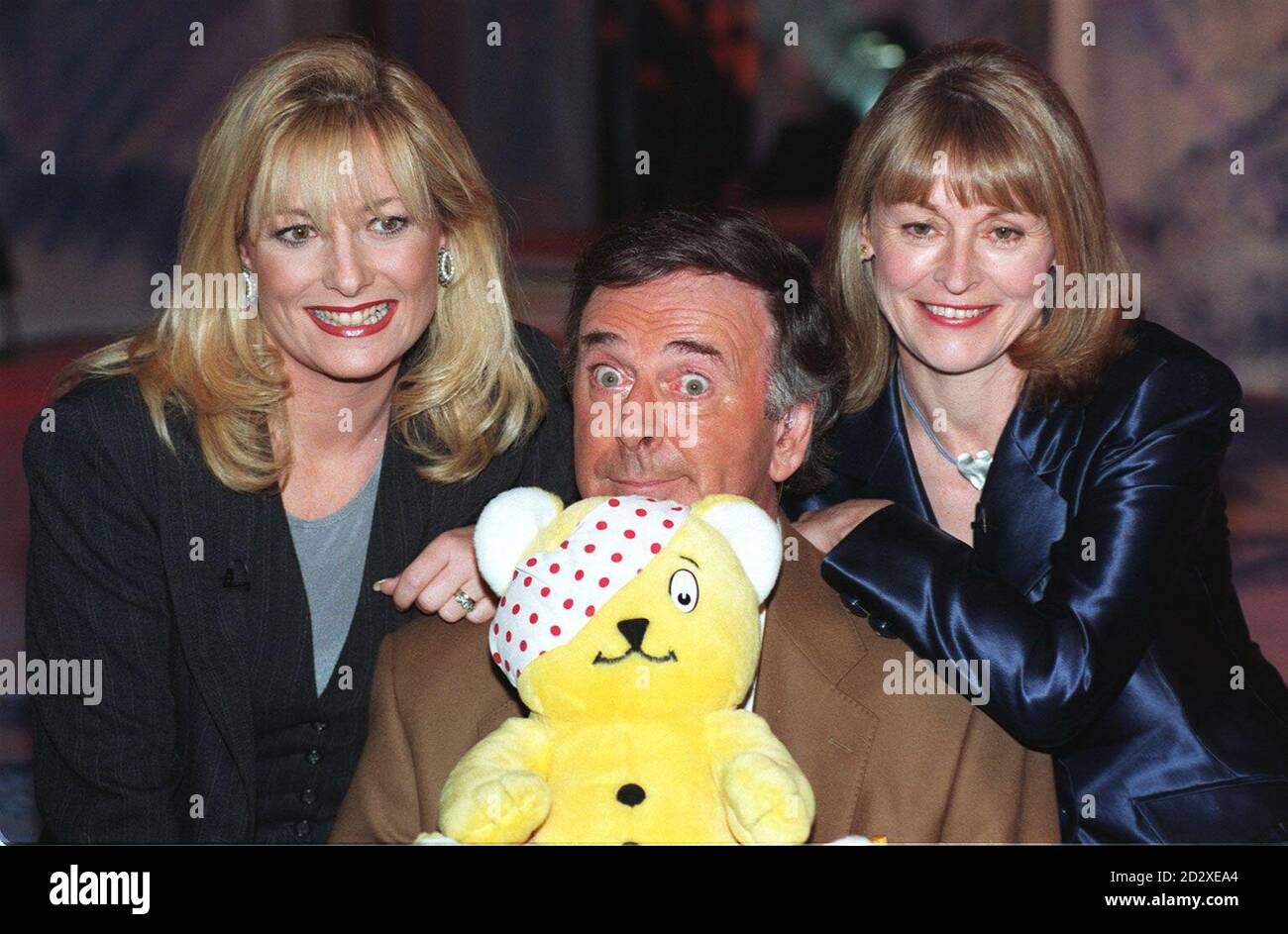 Library filer of Gaby Roslin (left) Terry Wogan and Sue Cook launching this year's BBC Children In Need appeal. It emerged today (Thur) that former Crimewatch host Sue Cook is quitting the BBC after 20 years - to present a major antiques show for Channel 4. See PA story TV Cook. Photo by Adam Butler/PA. Stock Photo