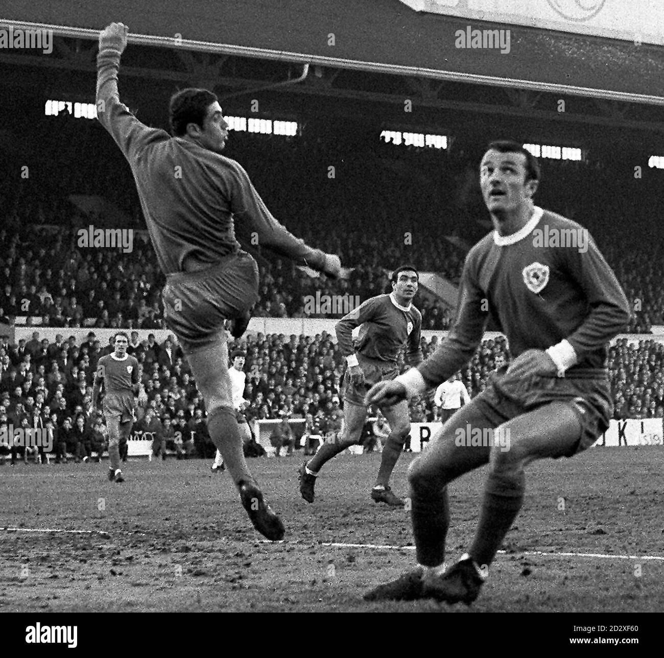 Black and white library file 131741-1, dated 16.12.67, showing a young Peter Shilton (left), in his first full season with Leicester City, leaping for the ball in support of his right back Rodrigues (right) in the face of a Tottenham Hotspur attack. Now with Leyton Orient, former England international Shilton, 47, today (Sunday) plays his 1,000 league game in an illustrious career that he believes will carry on past his 50th birthday. See PA Story SOCCER Shilton/PA. Stock Photo