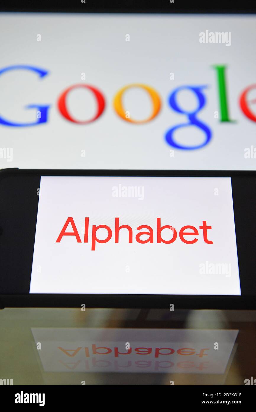 Google And Alphabet Inc Logos Displayed On Screens In London UK Stock 