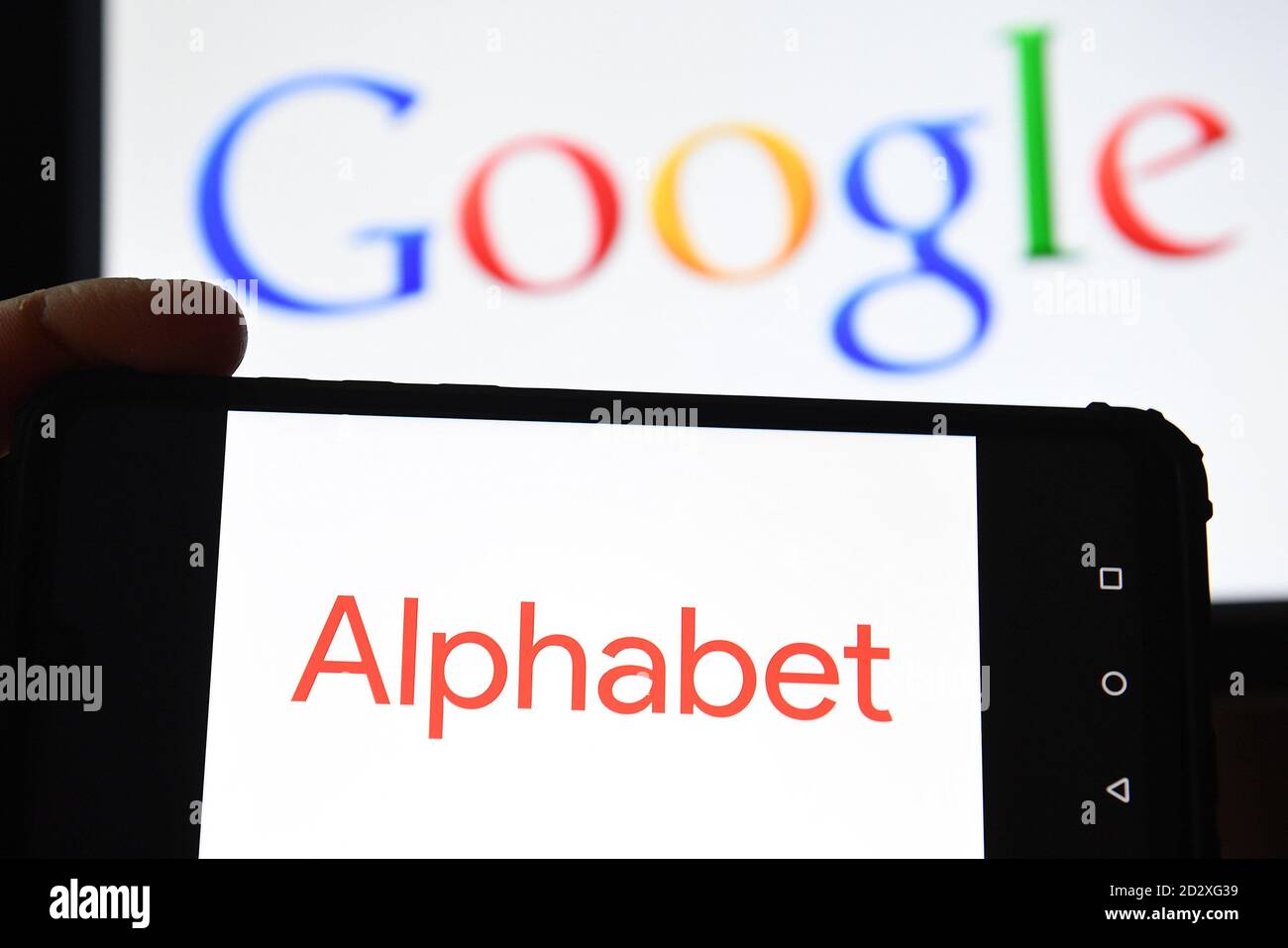 Google And Alphabet Inc Logos Displayed On Screens In London UK Stock 