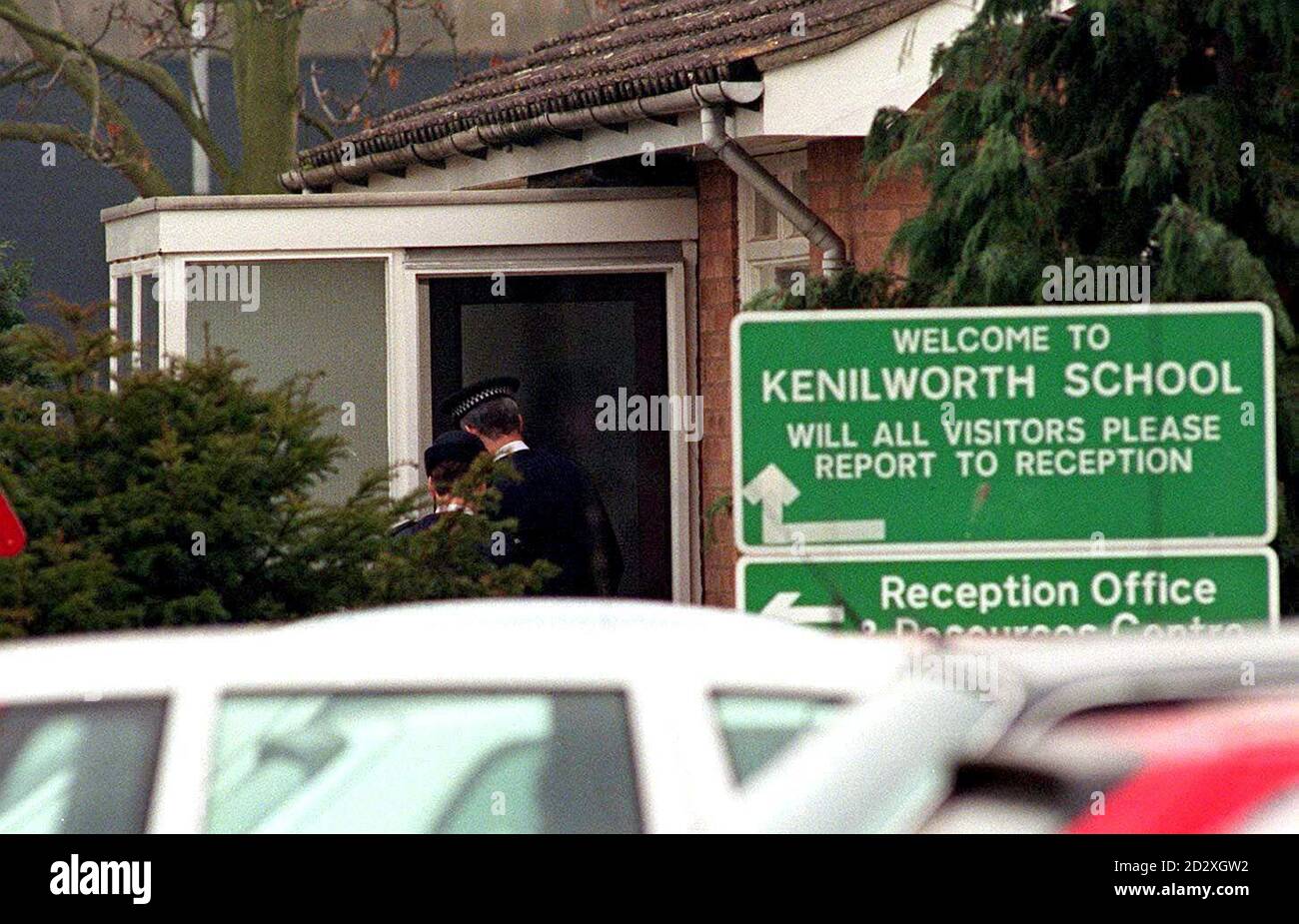 Police officers arrive at a caretaker's house on the Kenilworth School campus this morning (Monday). Police will today question a man about an incedent during the weekend when a man wielding an air rifle walked into the school sports hall. Picture DAVID JONES/PA. SEE PA STORY POLICE Gun. Stock Photo