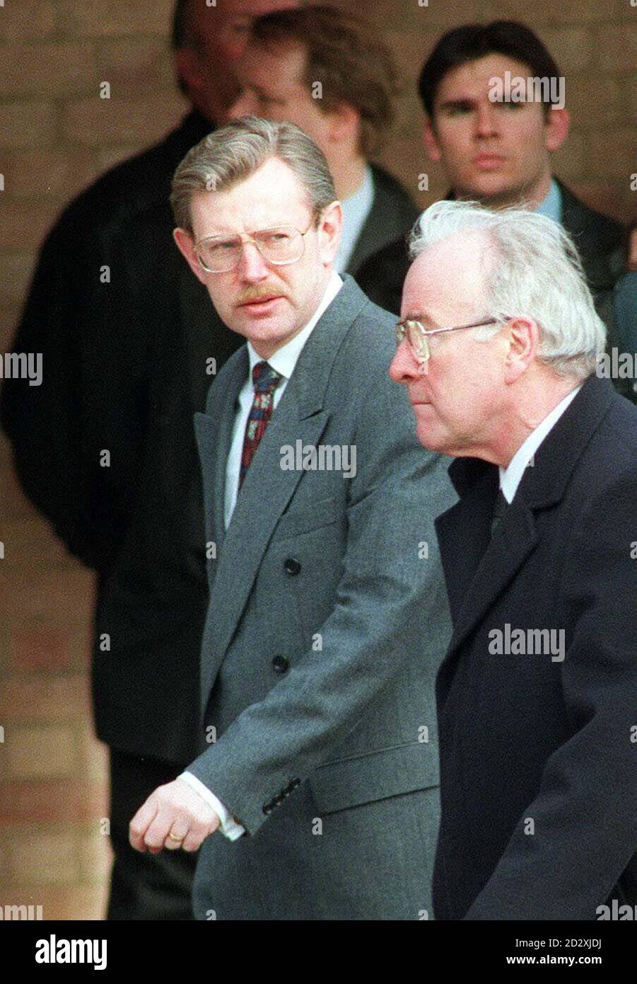Irish Ambassador Edward Barrington (light suit) arriving at Peterborough Crematorium today (Monday) for the funeral of Lance Bombadier Stephen Restorick, the 23-year-old who was shot dead at a vehicle checkpoint just outside of the village of Bessbrook, Ulster, on February 12. Picture by DAVID JONES/PA Stock Photo