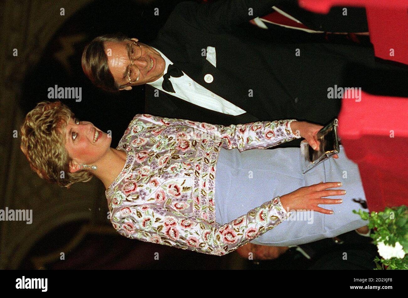 Diana's Dresses: Diana, Princess of Wales, wearing a long evening sheath dress of lilac silk crepe with a beaded over-bodice, by Catherine Walker,   at the 40th anniversary of the Queen's accessin in 1992.  The dress is part of a collection of 80 ballgowns belonging to the princess that will go under the hammer at Christie's in June. The charity auction, said to be the idea of her elder son, Prince William, will be held in New York on June 25, with proceeds going to the Royal Marsden Hosptial Cancer Fund and the Aids Crisis Trust. PA. SEE PA STORY ROYAL Diana. Photo by Martin Keene. Stock Photo