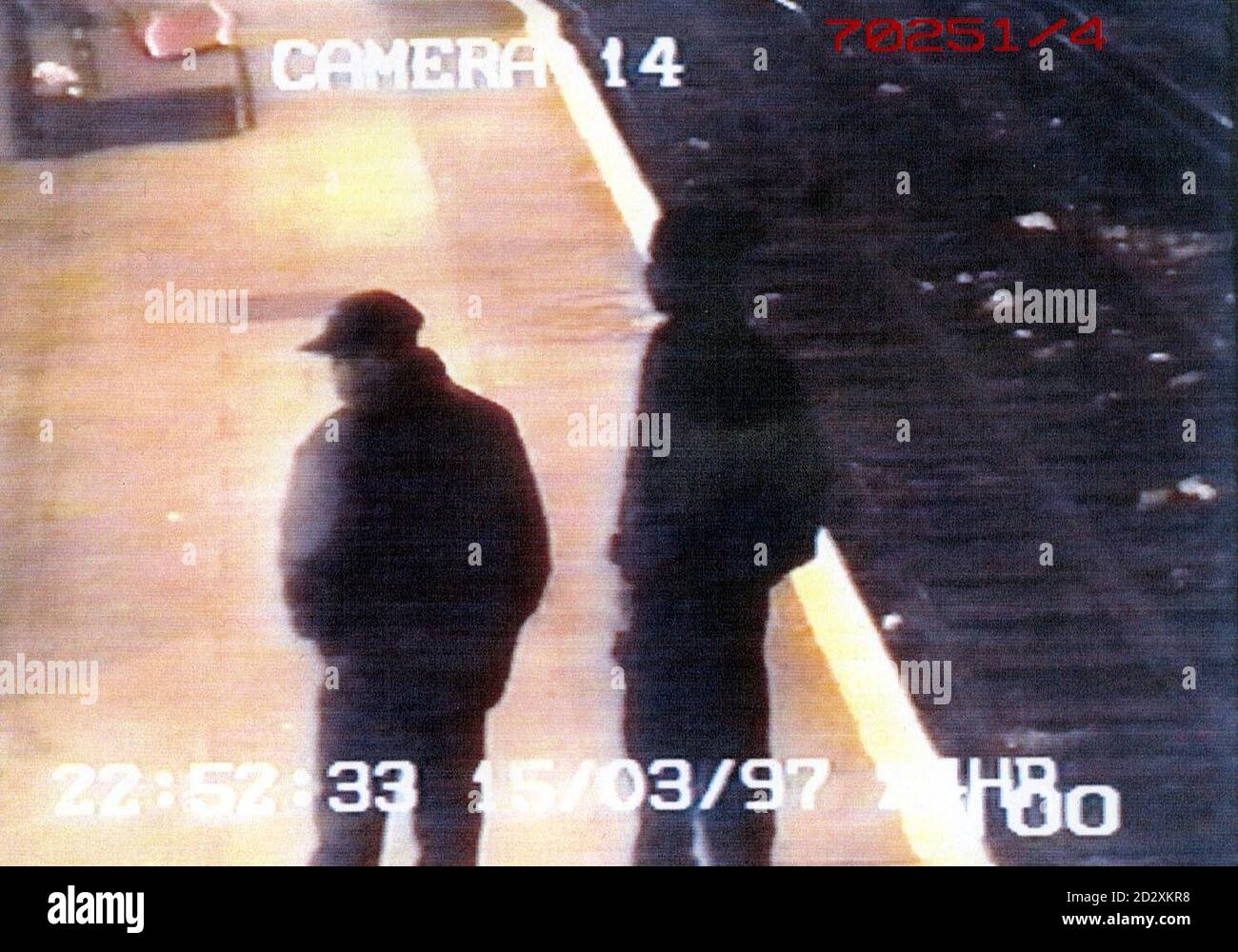 A police issued video still of two masked male robbers, described as black and aged 17-20, at Harrow and Wealdstone tube station on the Bakerloo line on Saturday night (15.3.97), where eight women were robbed at gunpoint. See PA Story CRIME Train. Stock Photo