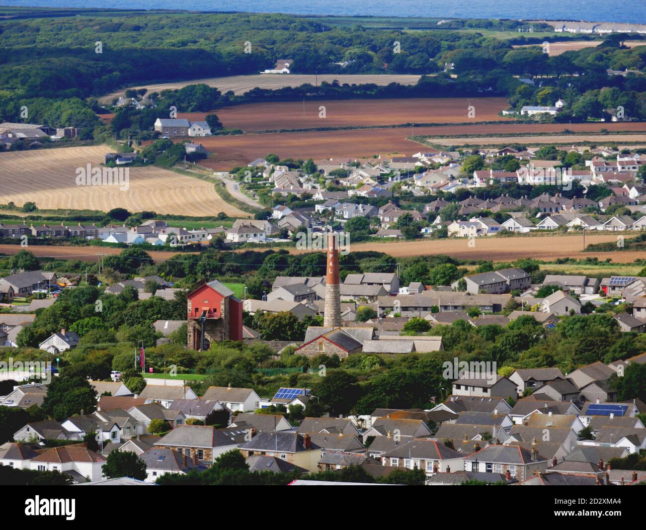 A view of Taylor's Shaft at East Pool mine, Redruth, from the summit of Carn Brea, Cornwall. Stock Photo