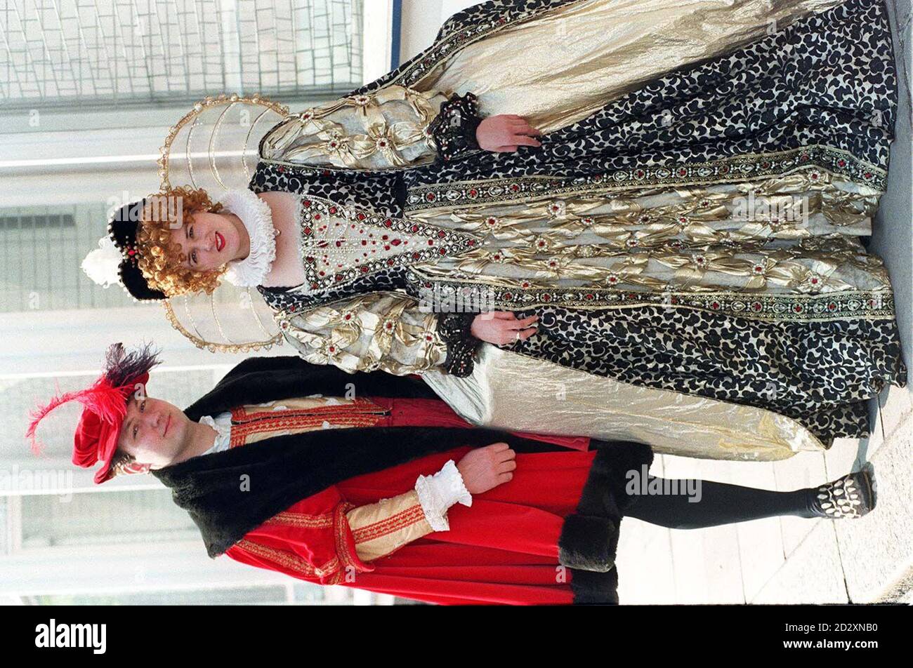 Emma Simpson and Edward Plackett model Elizabeth 1 and Henry VIII costumes, in London today (Thurs), as part of a huge collection of over 700 theatrical and fancy dress costumes, which will go under the hammer at Phillips, in Bayswater, on April 15. The jewelled dress is reputed to have been worn by Glenda Jackson in her role as Elizabeth I, and hopes to fetch 275-300 with the Henry VIII costume estimated at 175-200. Photo by Rebecca Naden. 15/04/97: The jewelled Elizabeth I gown believed to have been worn by actress Glenda Jackson in the hugely popular TV drama Elizabeth R, sold for 1,375, Stock Photo