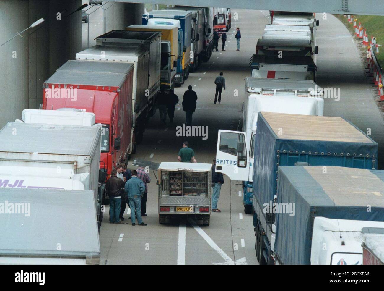The lorry park on the M20 motorway at Folkestone in Kent today (Wednesday), following a blockade by striking French fishermen at the ports of Calais, Boulogne and Dunkirk. Part of the M20 was closed to provide the lorry park for delayed truck drivers. Photo by David Giles. See PA Storyy SEA Blockade Stock Photo