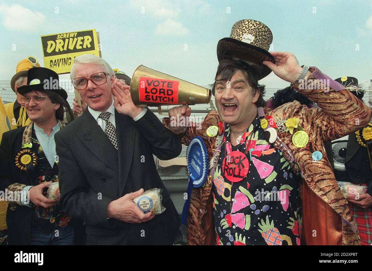 Prime ministerial look-alike Peter Friel listens as Screaming Lord Sutch, leader of the Monster Raving Loony Party, which is fielding thirty-five candidates in the General Election, gives a news conference on Westminster Bridge today (Thursday). See PA story ELECTION Looney. Photo by Fiona Hanson/PA Stock Photo