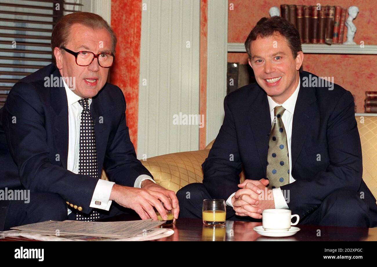 TV presenter, David Frost (left), with the Labour leader, Tony Blair, at the BBC TV Centre in London.  Mr Blair was this the guest on his on regular Sunday programme, 'Breakfast with Frost'.  Stock Photo