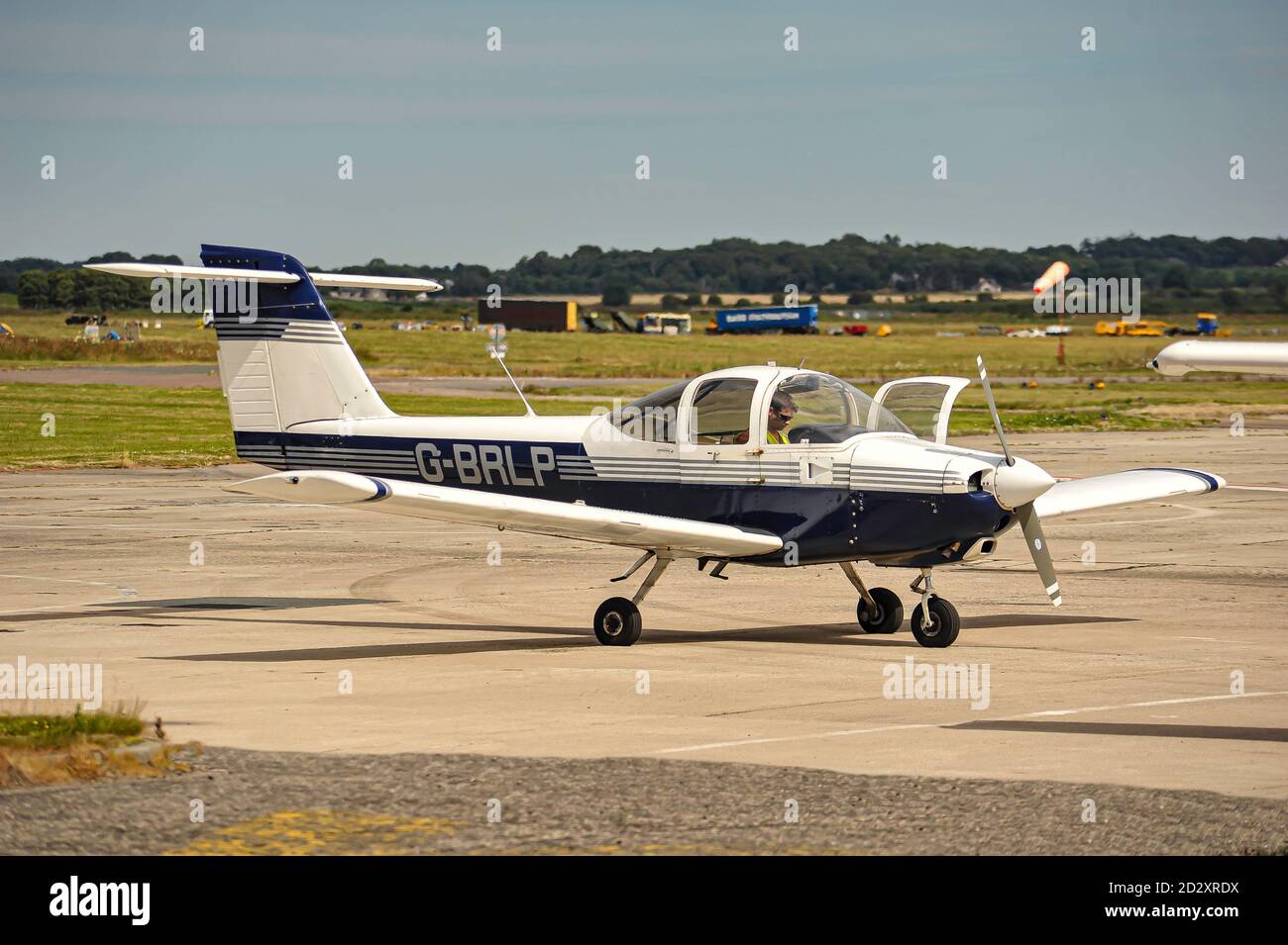 A Piper PA-38-112 operating out from its home base with Highland Aviation at Inverness Airport in Scotland. Stock Photo