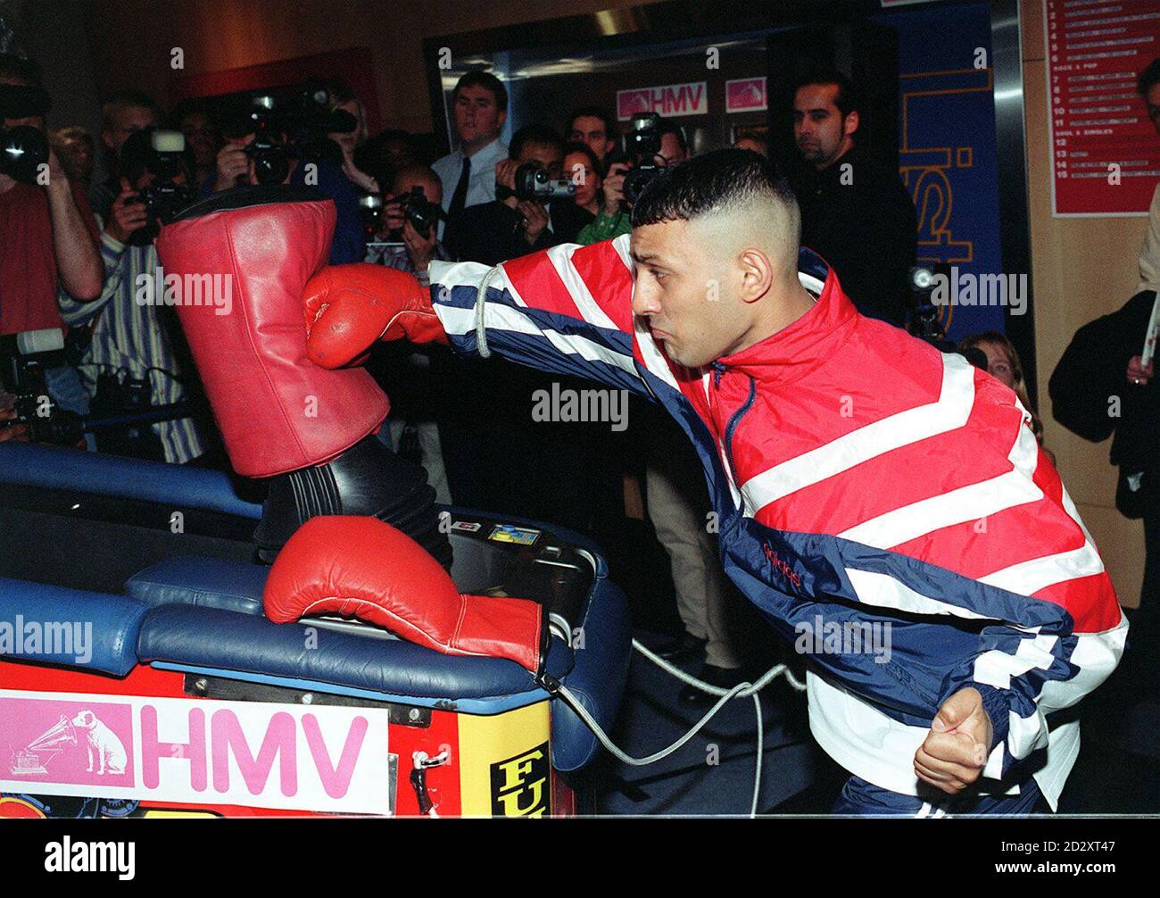 WBO and IBF champion Prince Naseem Hamed, shows his form, as he launches his new video - The Prince Who Is King, at HMV, in London today (Friday). Photo by Sam Pearce. Stock Photo