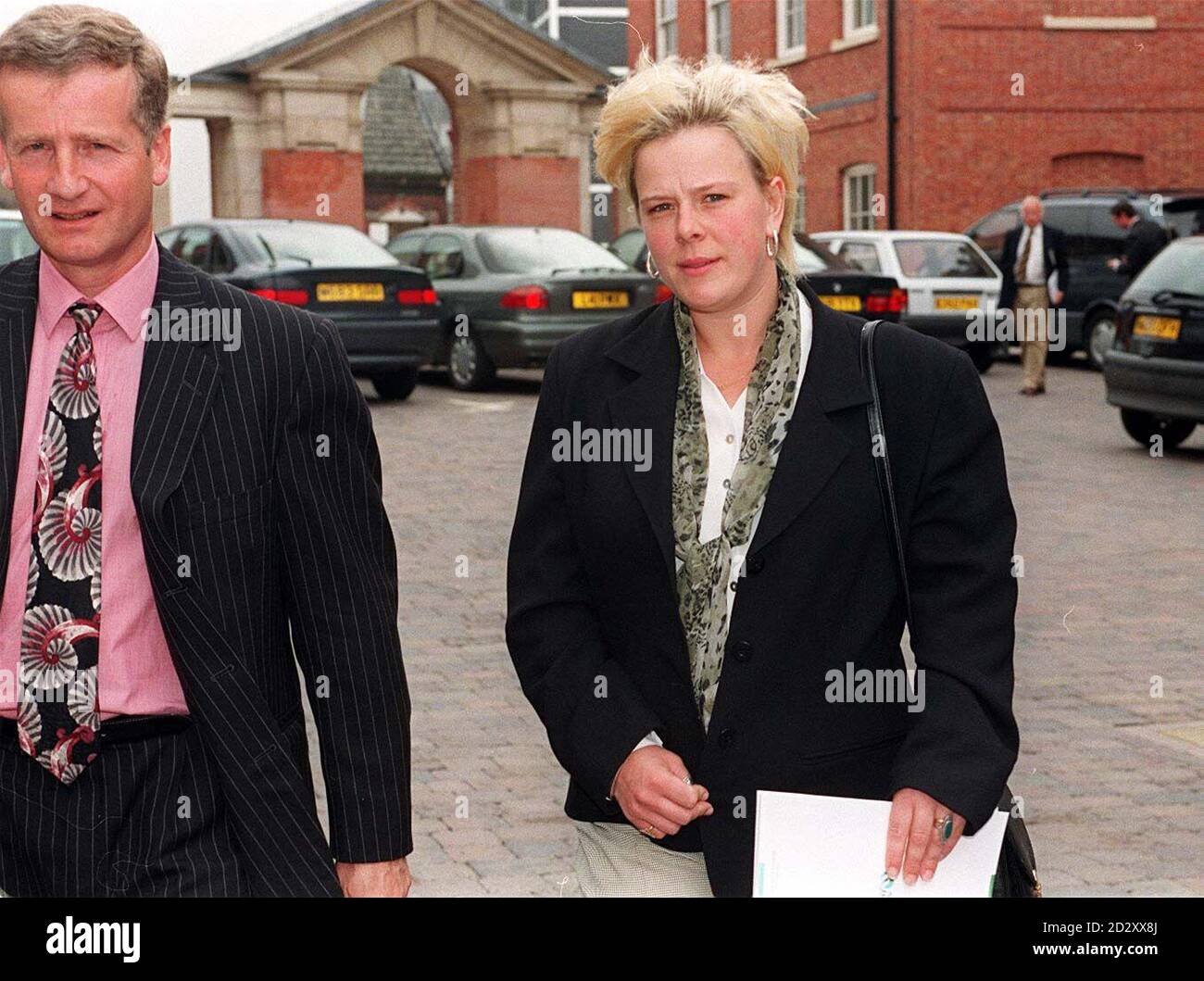 https://c8.alamy.com/comp/2D2XX8J/toni-calladine-mother-of-hollie-calladine-leaves-nottinghamshire-health-authoritys-headquarters-with-her-solicitor-paul-balen-after-listening-to-this-mornings-thursday-news-conference-the-authority-have-agreed-to-try-and-claim-back-some-700000-damages-awarded-to-the-brain-damaged-nine-year-old-who-died-just-eight-days-after-the-award-was-made-photo-by-david-jonespa-see-pa-story-health-damages-2D2XX8J.jpg