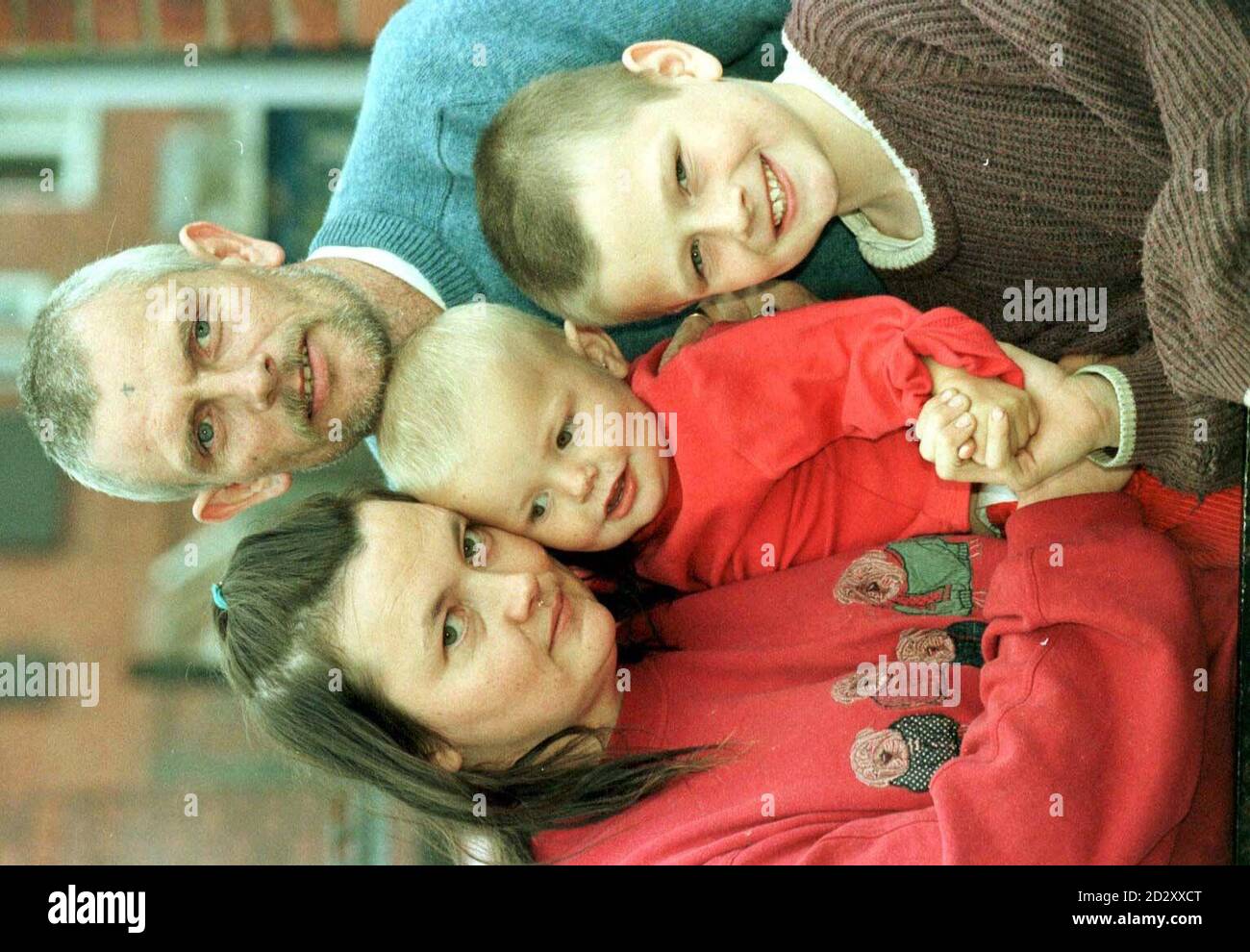 Susan and Leslie Robinson, from Hartlepool, cuddle their 18-month old ...