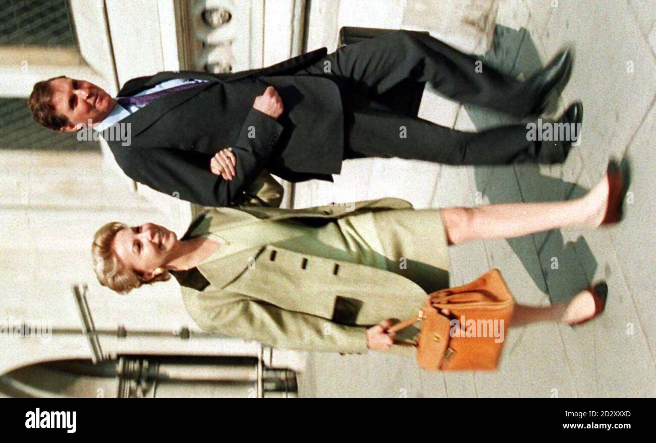 Library picture dated 4.6.97. of Jonathan Aitken and his wife Lolicia arriving at the High Court in London earlier this month. Jonathan Aitken suffered public humiliation today (Friday) when he dramatically discontinued his libel action in the face of last-minute evidence that he had lied to the High Court. Mr Aitken, who resigned from the Cabinet in 1995 to pursue The Guardian and Granada TV with the 'sword of truth' and the 'shield of fair play', now faces a costs bill unofficially estimated at nearly 2 million. Neither Mr Aitken nor his wife, Lolicia, who yesterday announced their separa Stock Photo