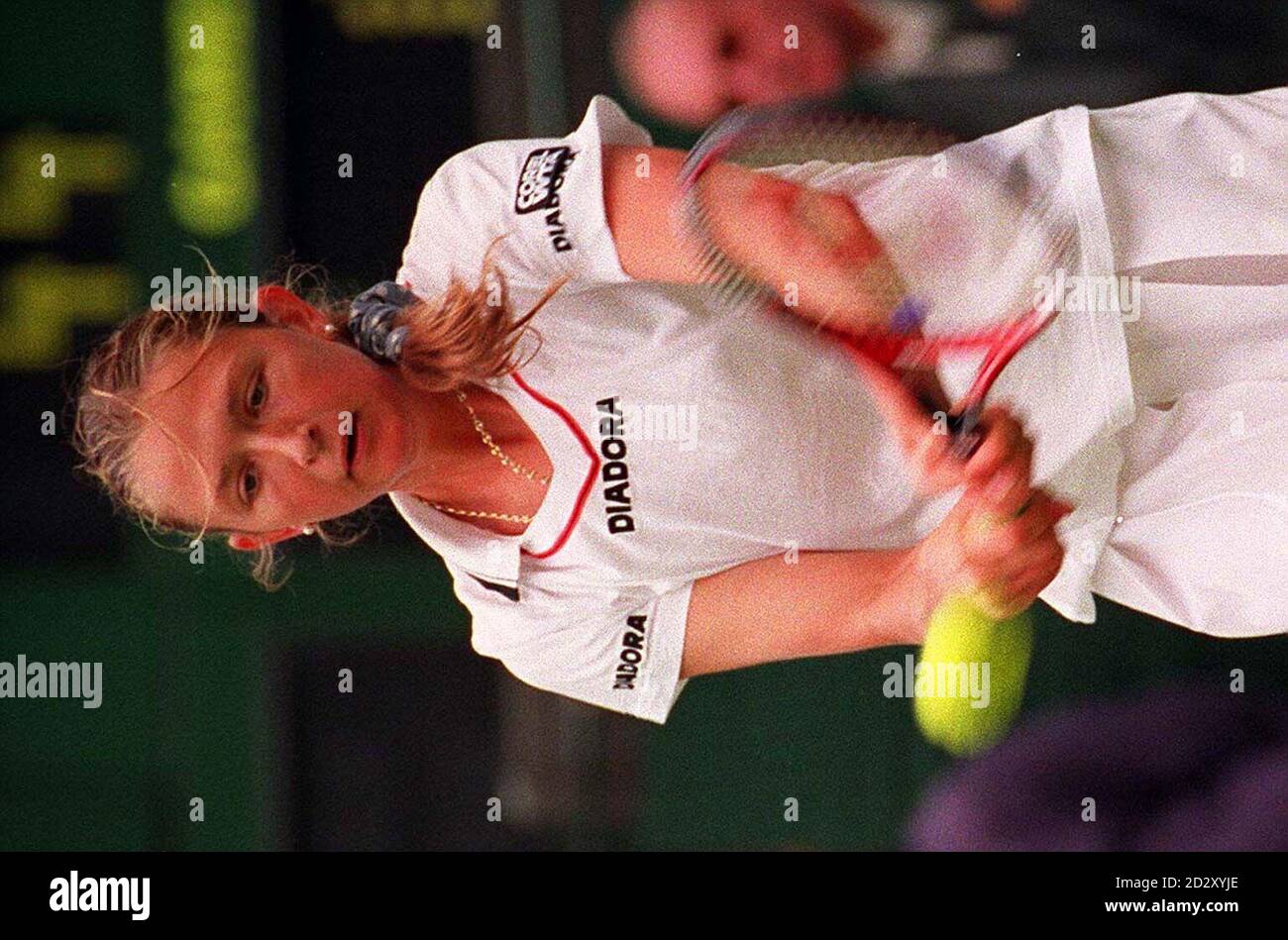 Russia's Elena Likhovtseva on Centre Court this morning (Saturday) where she won the resumption of her rain-delayed first round match against Belorussia's Natalie Zvereva. Photo by Fiona Hanson/PA. Stock Photo