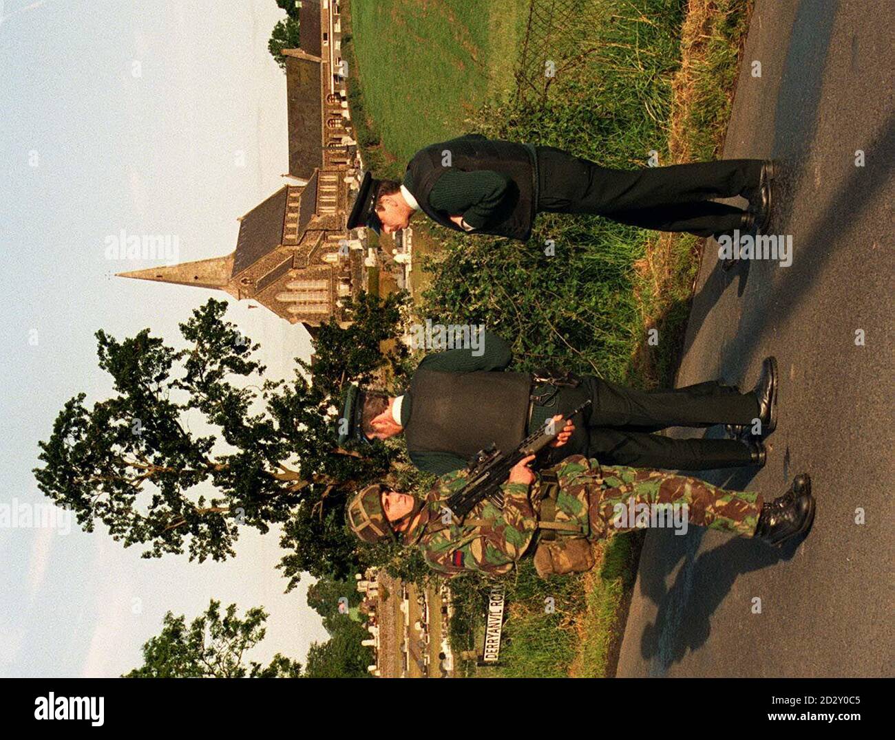 Soldiers and RUC Officers patrol around Drumcree Church today (Sat ...
