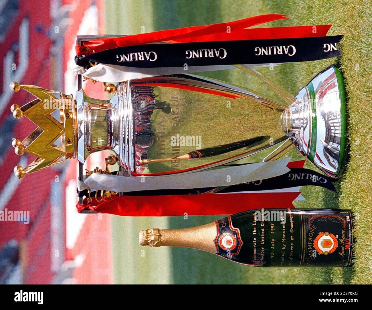 The Premiership Title Trophy and the Manchester United own brand Champagne on display for the