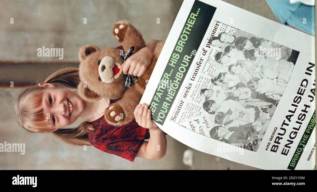A young girl taking part in a Sinn Fein organised protest outside ...