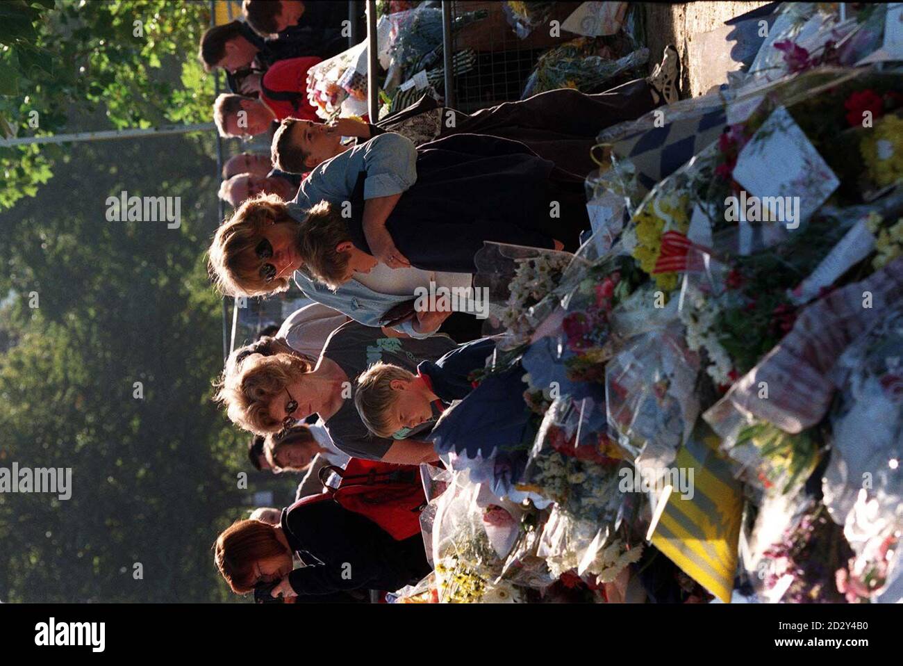 The scene at Kensington Palace this morning (Monday) with crowds still leaving floral tributes to Diana, Princess of Wales. Photo by David Giles. Stock Photo