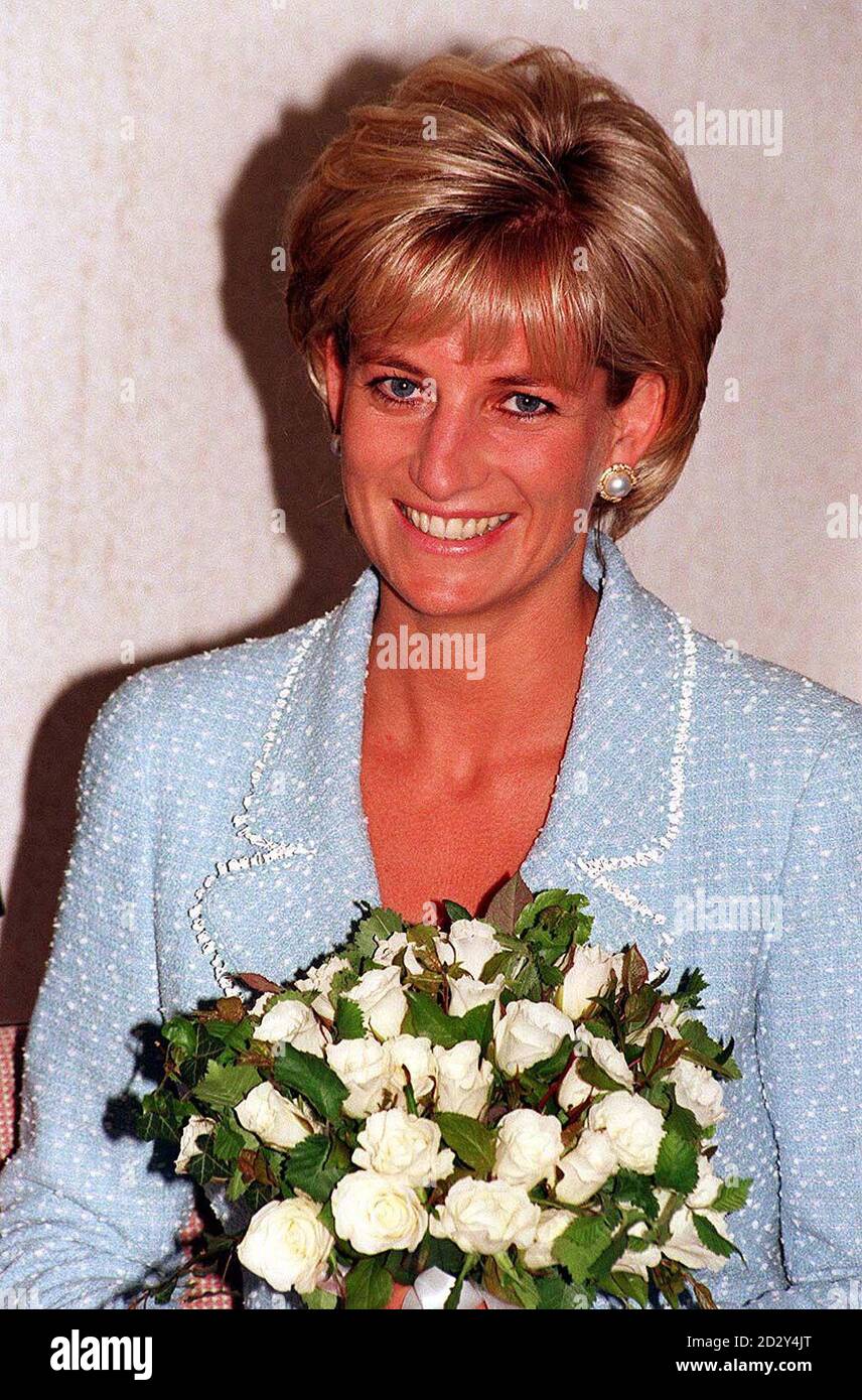 Diana, Princess of Wales is presented with the first rose to be named ...