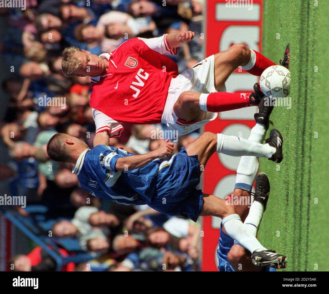 Arsenal's Dennis Bergkamp beats Chelsea's Dennis Wise to the ball during today's (Sunday) Premiership match at Stamford Bridge. Photot by Tony Harris/PA Stock Photo