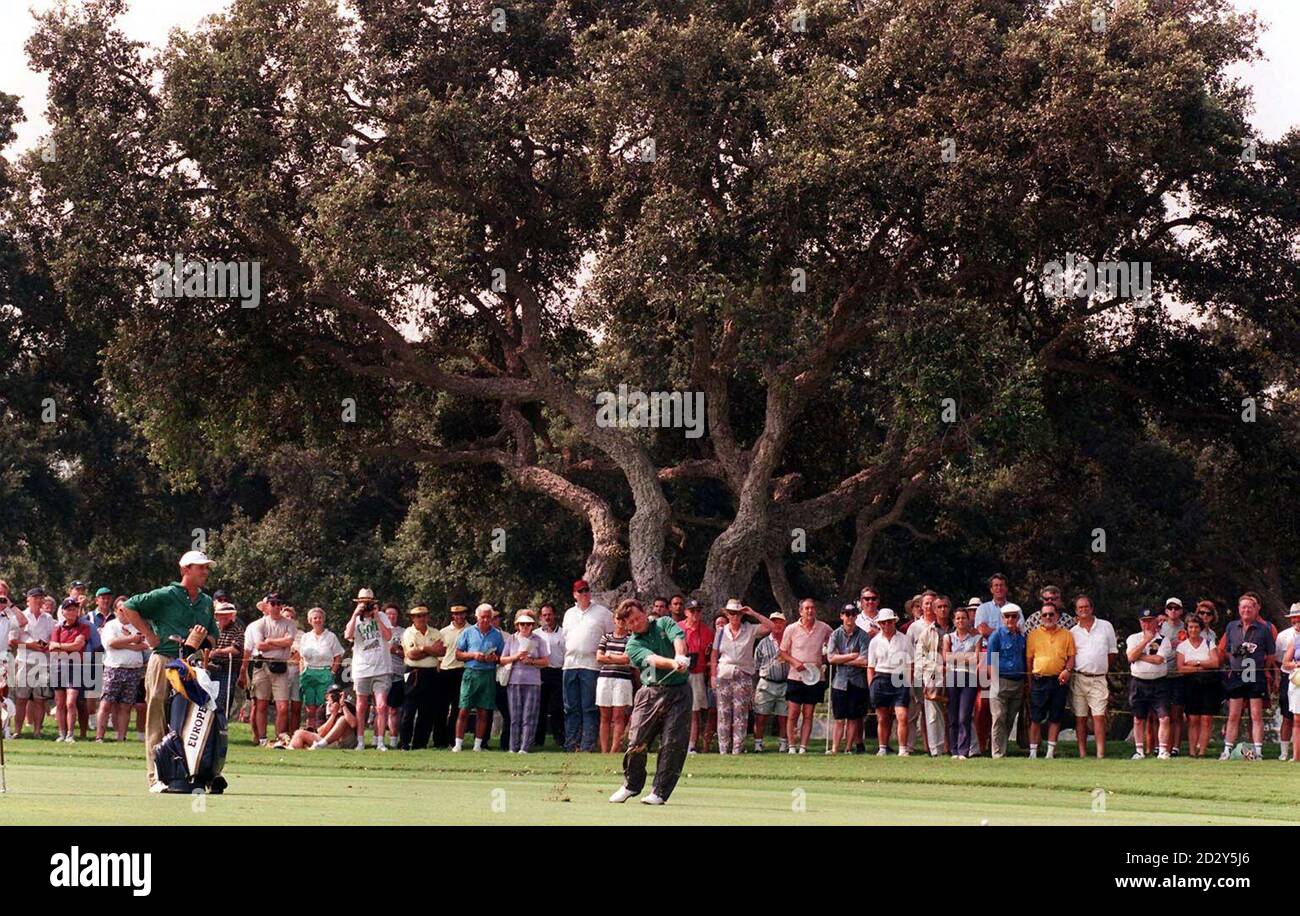 Europe's Ian Woosnam (right) attracts the interest of spectators during a practice round at Valdaramma, Spain - the venue of the Johnnie Walker Ryder Cup '97, later this week. (Woosnam's caddy Phil Morbey (right)). Photo by Barry Batchelor/PA. Stock Photo