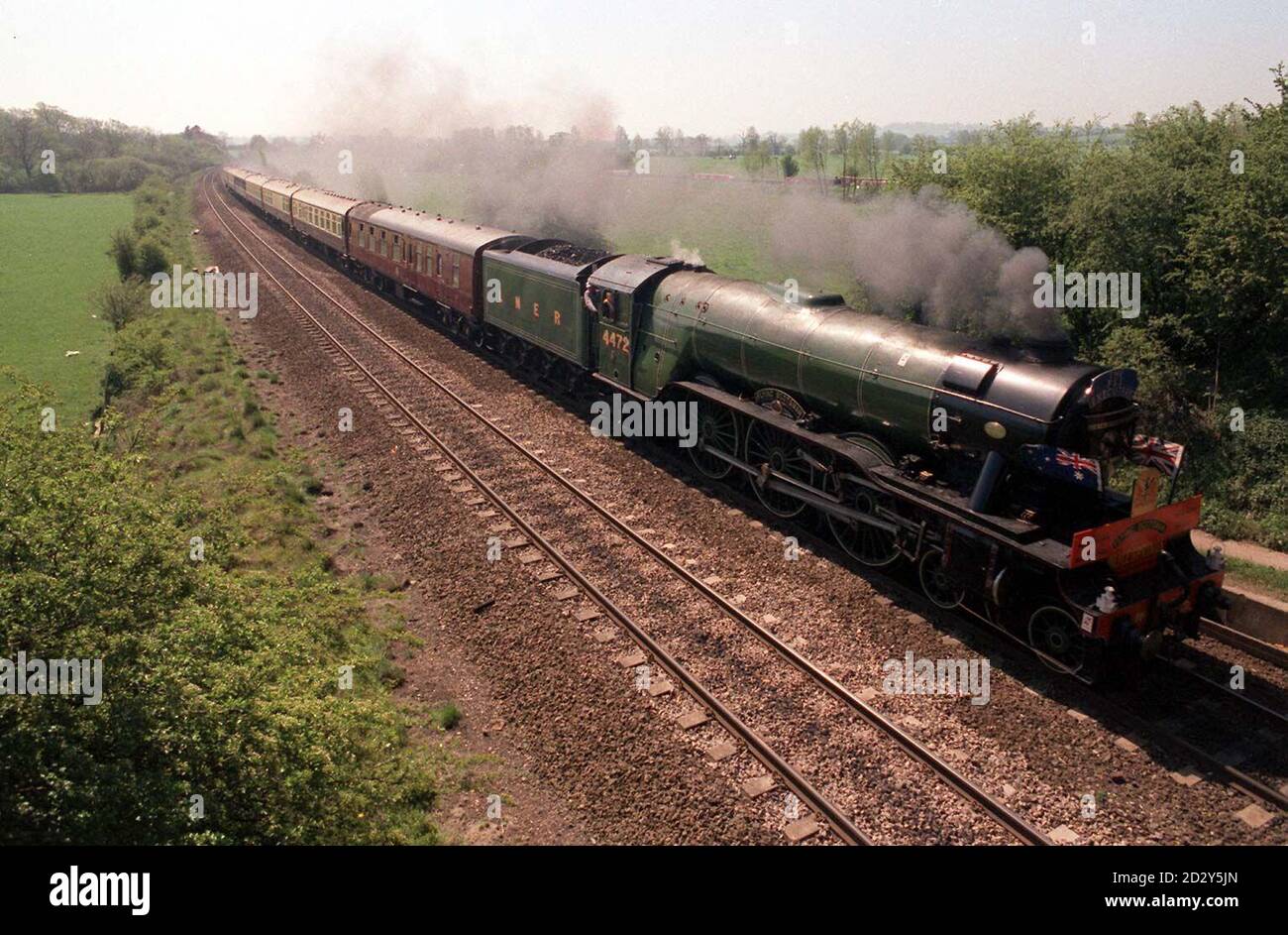 The 'Flying Scotsman' whistles through the Oxfordshire countryside. 25