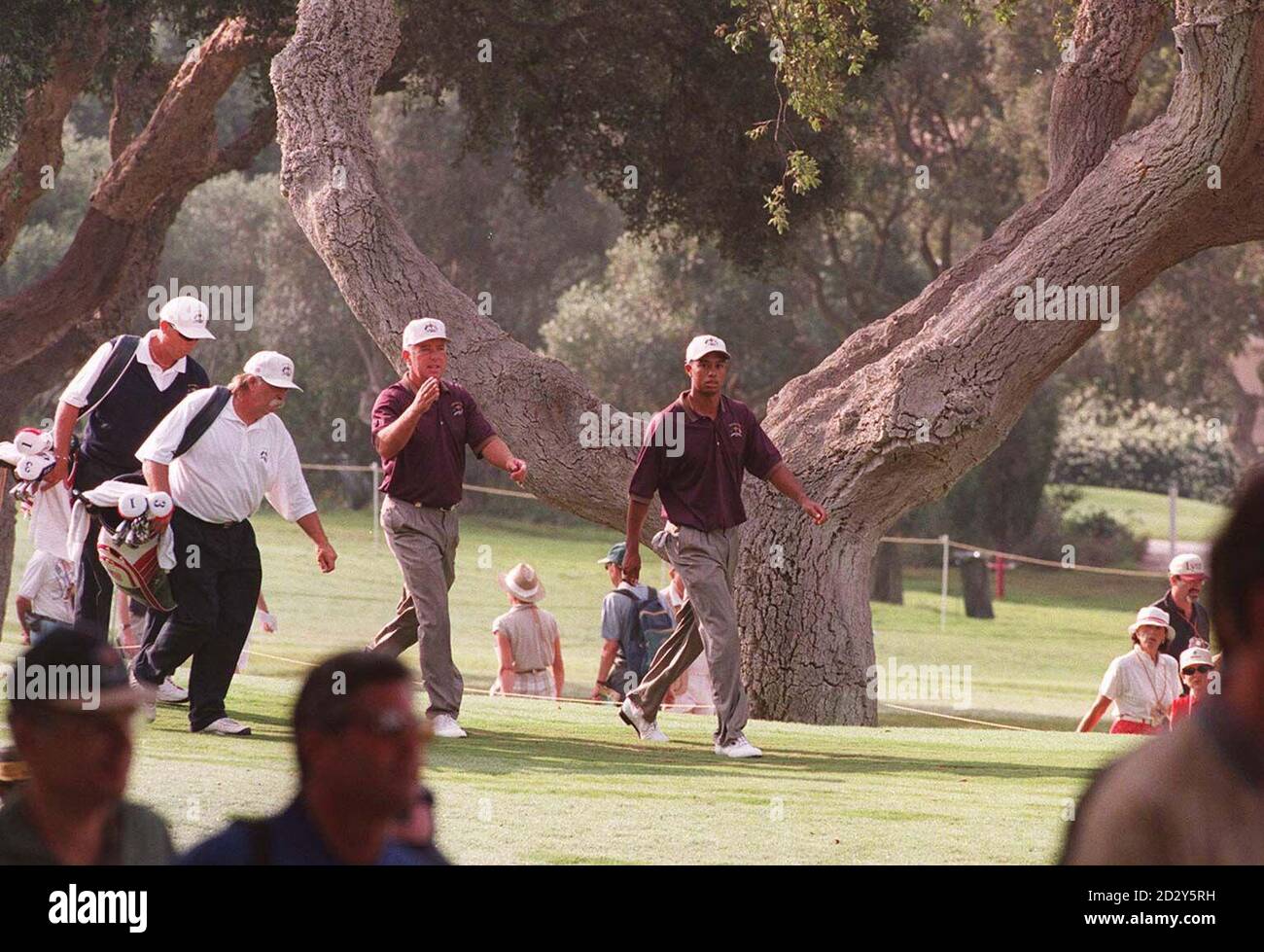 American Ryder Cup players Tiger Woods (right) and Mark O'Meara take the scenic route during a practice round on the Valderrama course in Spain this morning (Thursday) in preparation for the Ryder Cup tournament which starts there tomorrow. See PA Story GOLF Ryder. Photo by Barry Batchelor/PA Stock Photo