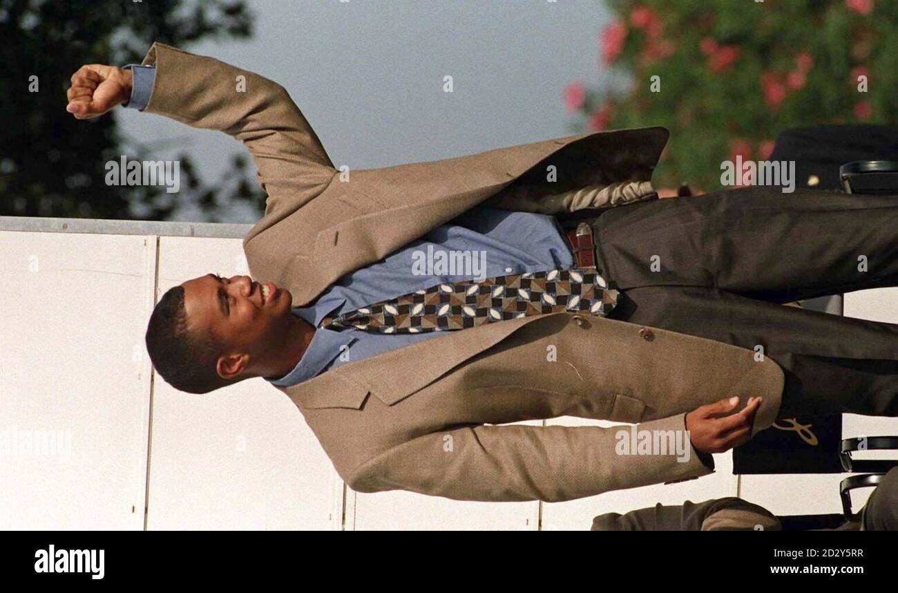American Ryder Cup team member Tiger Woods acknowledges the crowd at the opening ceremony on the course at Valderrama in Spain today (Thursday). Photo By Barry Batchelor/PA Stock Photo