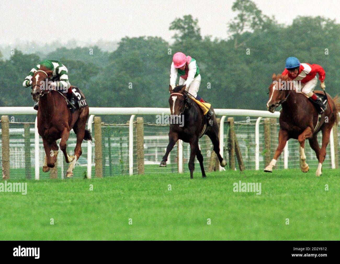 Glorosia ridden by Frankie Dettori (left) winning the Fillies Mile  at Ascot today (Sunday) from Jibe (centre) ridden by K.Fallon and Exclusive , M.J.Kinane 3rd (right). Photo by Martyn Hayhow. Stock Photo
