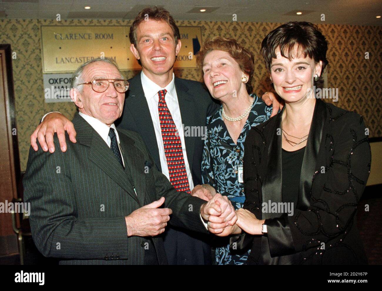 Prime Minister Tony Blair with his wife Cherie (right), his father Leo