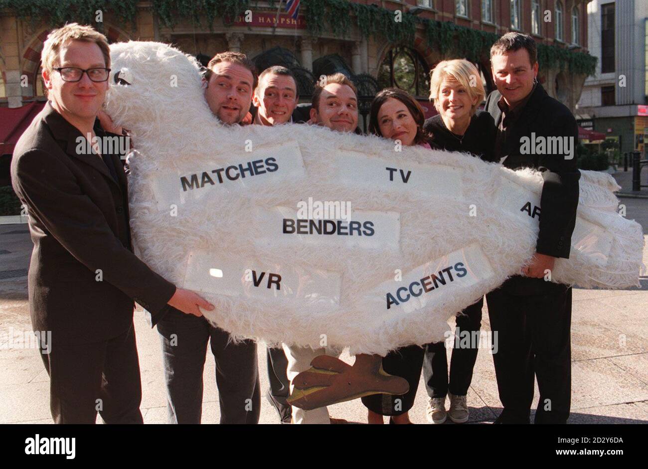 Vic Reeves (left to right), John Thomson, Paul Whitehouse, Bob Mortimer, Arabella Weir, Ulrika Jonsson and Charlie Higson announce a live comedy event today (Wednesday) of Shooting Stars and The Fast Show to take place at the London Labarr's Apollo Hammersmith opening on January 27 1998.  Photo by Lucy Husband/PA. Stock Photo