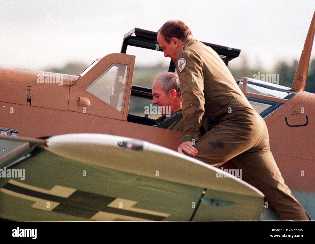 John R. Alison Air Chief Marshal Sir John Allison sits in the cockpit of the world's ...