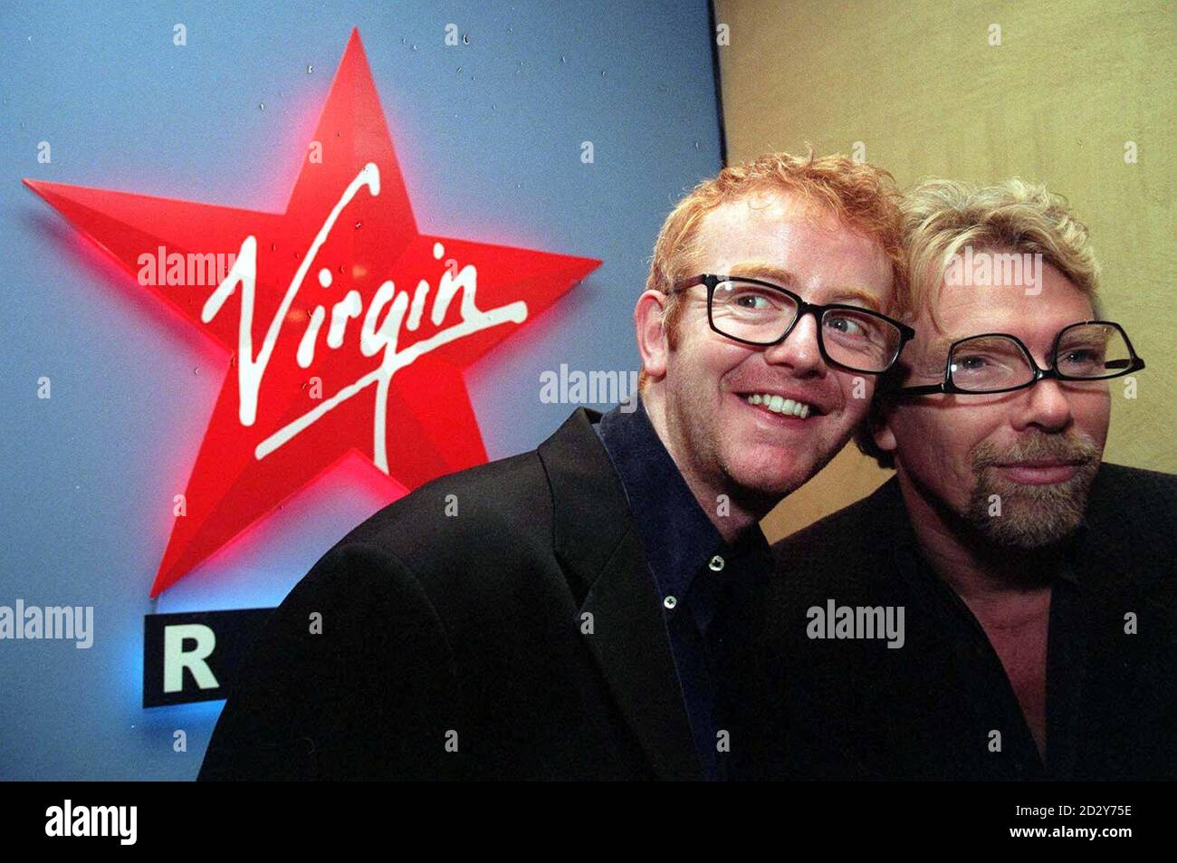 DJ Chris Evans (left) with Virgin boss Richard Branson, after his debut  breakfast show on Virgin radio, this morning (Monday). Evans sent his new  Radio bosses frantic however, by arriving for his