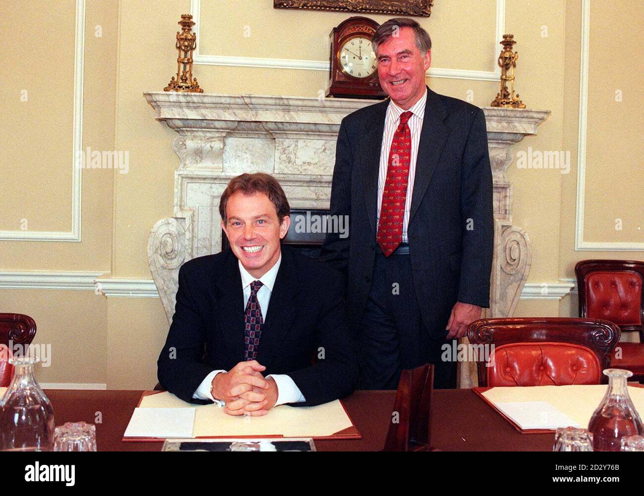 Prime Minister, Tony Blair (left) with  Eric Anderson in the Cabinet Office at Number 10, in London.  Eric Anderson, Blair's former teacher at Fettes Independent School, Edinburgh is now the Rector of Lincoln College, Oxford. Stock Photo