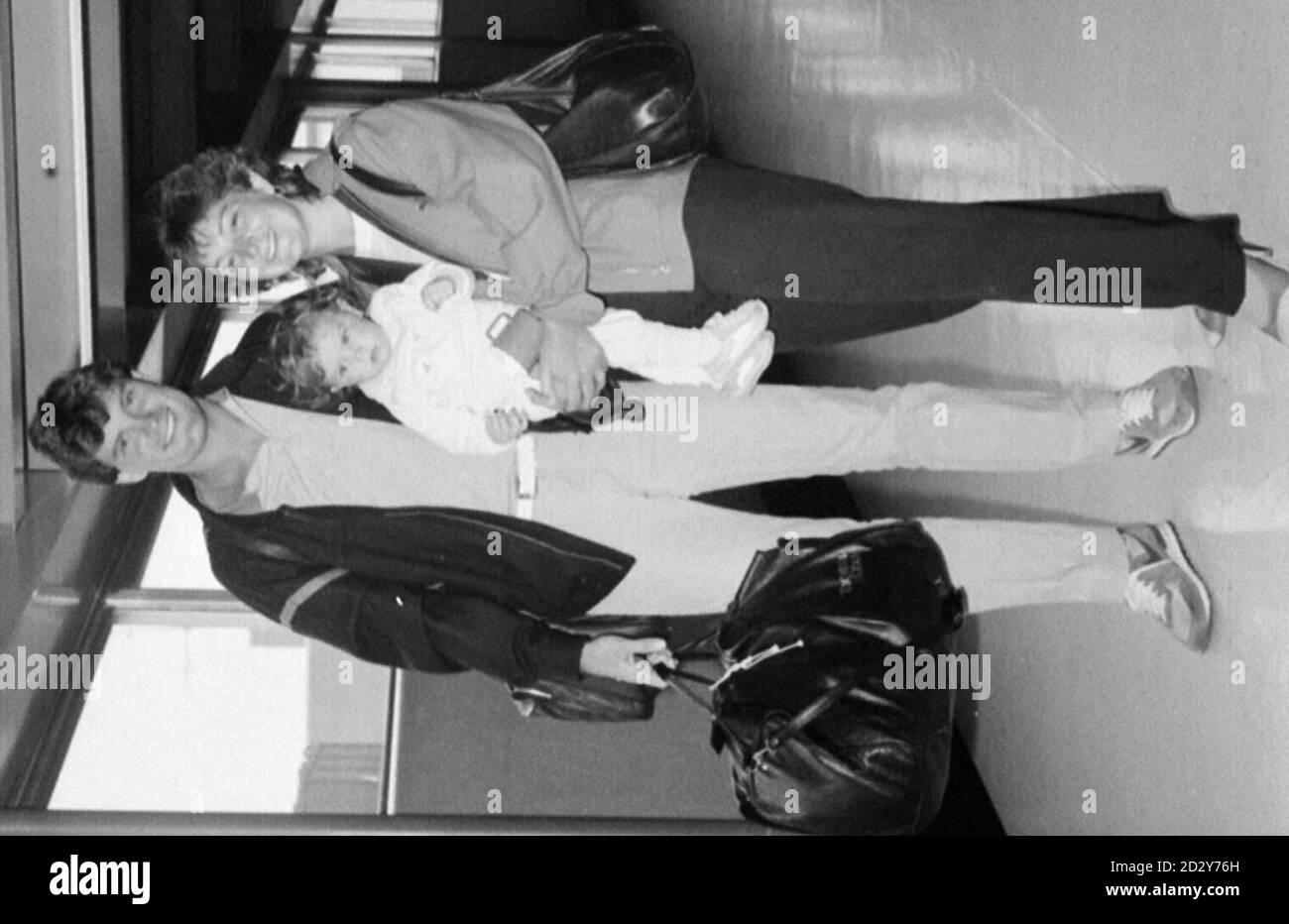 PA LIBRARY PHOTO DATED 30.3.84 : GLENN HODDLE AND HIS WIFE ANNE AND 13-MONTH-OLD DAUGHTER ZOE AT HEATHROW AIRPORT : England coach Glenn Hoddle is to separate from his wife, Anne, after 18 years of marriage, the Football Association said tonight. See PA Story SPORT Hoddle. PA Photos. (Available in b/w Only) Stock Photo