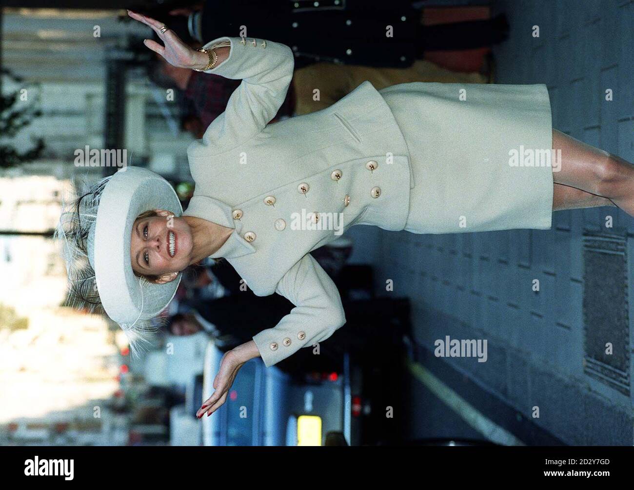Jilly Johnson, model and author dons a Herbert Johnson hat as she arrives for the charity 'Mad Hatter's Tea Party' at Claridges, London, a fundraising event for the Scientific Exploration Society, today (Wednesday). Photograph by Ben Curtis /PA. Stock Photo