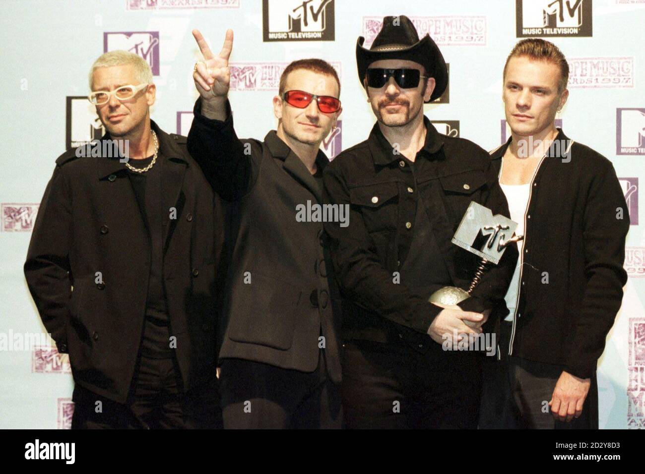 Ireland's U2  backstage at the MTV Europe Music Awards ceremony in Rotterdam after being presented with the award for Best Live Act. (L-R) Adam Clayton, Bono Vox, The Edge & Larry Mullen Jr. Stock Photo