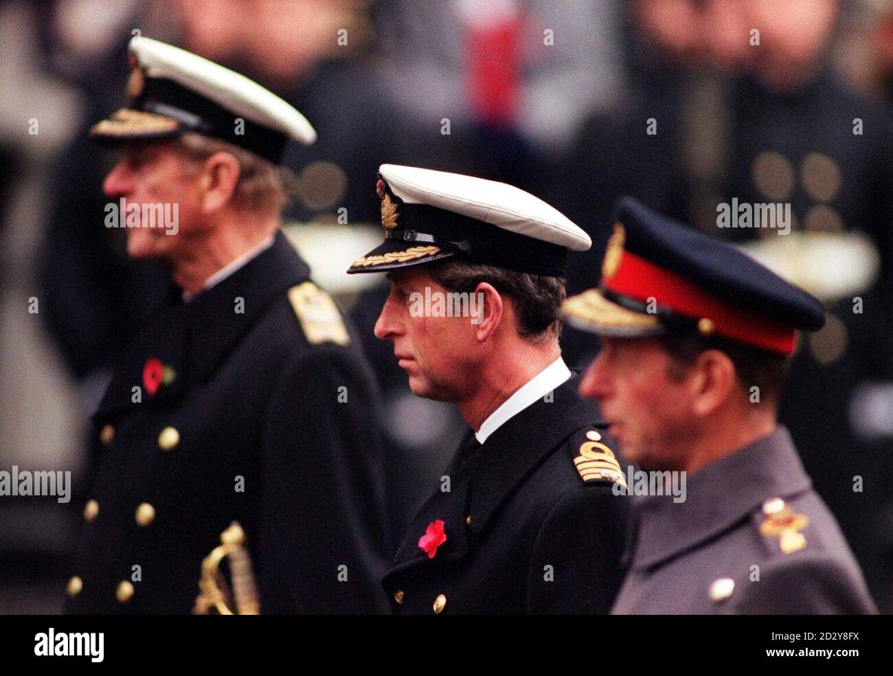 The Prince of Wales flanked by the Duke of Edinburgh (left) and the ...