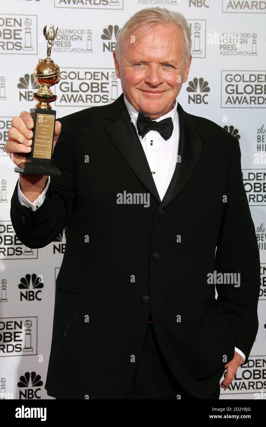 Actor Anthony Hopkins shows his Cecil B. DeMille Award for outstanding  contribution to the world of entertainment at the 63rd Annual Golden Globe  Awards in Beverly Hills, California January 16, 2006 Stock