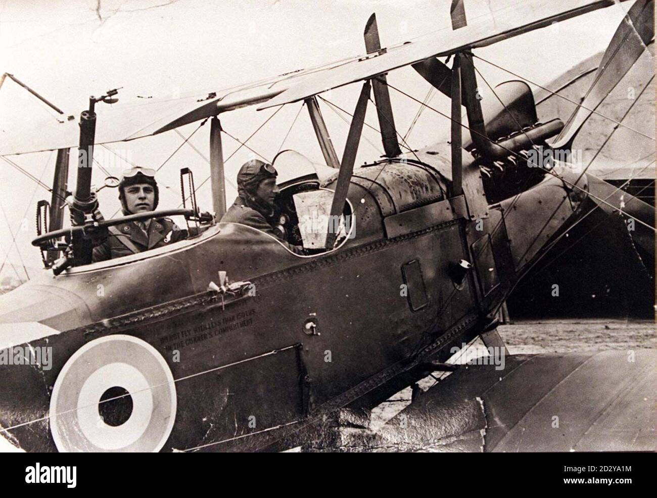 Group Captain Tilden Thompson (right) in his 120 horse power 100 MPH, R.E. 8 which may solve the 80-year-mystery surrounding the death of the Red Baron.  David Thomson said today (Wednesday) that his father Tilden flew a two-seater spotter plane low over German lines as a decoy to lure Baron Manfred von Richthofen into a trap.  See PA Story HISTORY Baron.  Photo PA. Stock Photo