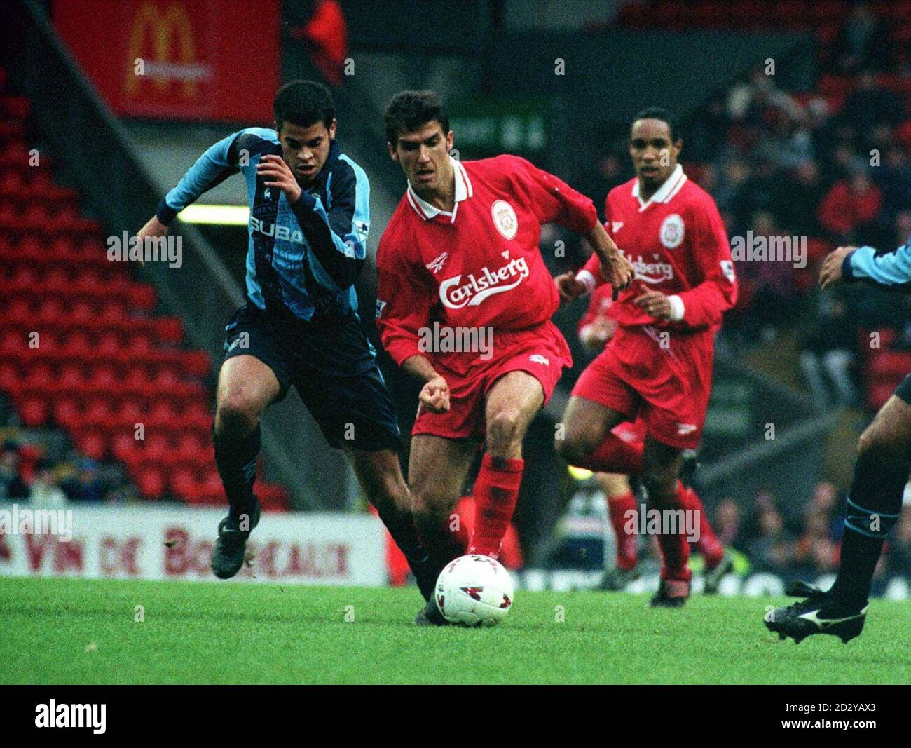 This picture can only be used within the context of an editorial feature. Coventry City's Richard Shaw (L) and Liverpool's Karlheinz Riedle fight for the ball, during their FA Cup 3rd Round football match at Anfield. 30/03/2000 : Riedle takes over at Fulham. 30/03/2000 : Riedle confirmed as caretaker manager of Fulham FC, after the club sacked Paul Bracewell on 29/03/2000. Riedle will take temporary charge of team affairs until the end of the season. Stock Photo