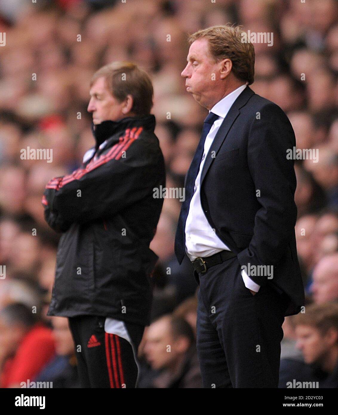 Tottenham Hotspur manager Harry Redknapp (right) on the touchline. Stock Photo
