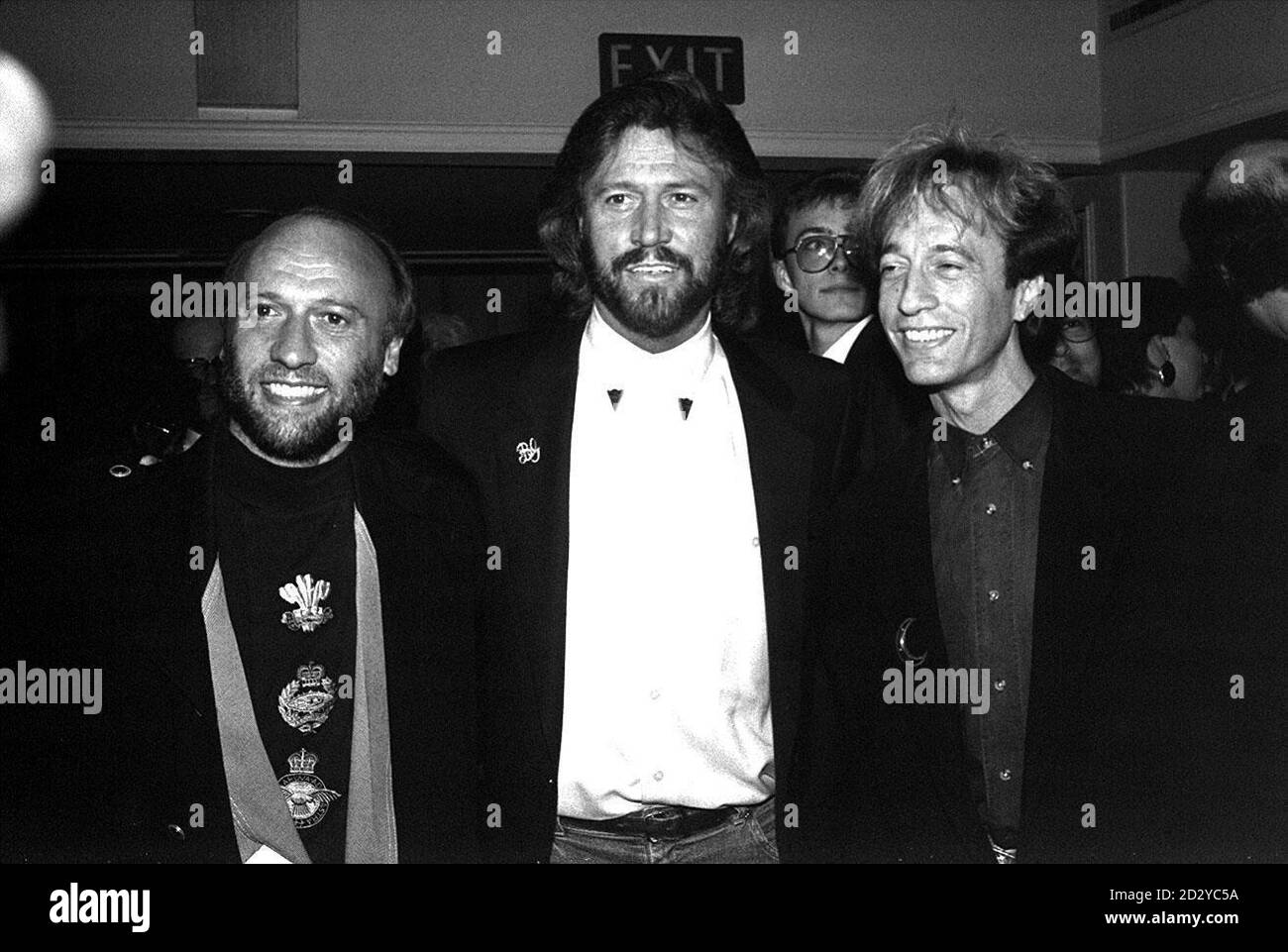 BRITISH POP TRIO THE BEE GEES. THE GIBB BROTHERS BARRY (CENTRE) AND TWINS MAURICE (LEFT) AND ROBIN (RIGHT) 27/9/99 to be honoured with a collection of stamps which are to be issued by the island of their birth  where their mother once ran a Post Office. I ve Gotta Get A Message To You is aptly one of the global hits commemorated on the set of Isle Of Man stamps to be issued on October 12. All but the youngest musical brother Andy were born on the Isle of Man, and eldest brother Barry was nine by the time the family moved to Manchester in 1955. Stock Photo