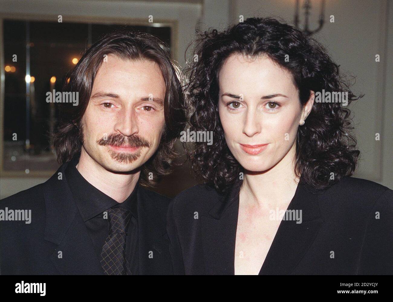 Full Monty film star Robert Carlyle arrives with his wife Anastasia for the Evening Standard British Film Awards. Stock Photo